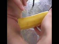 Closeup insertion video features perfectly shaved amateur teen banging herself with banana